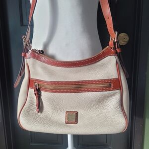 Dooney & Bourke Pebble Grain Piper.  COLOR- BONE
